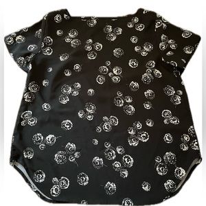 Ann Taylor black short sleeved blouse with white flowers. Size S